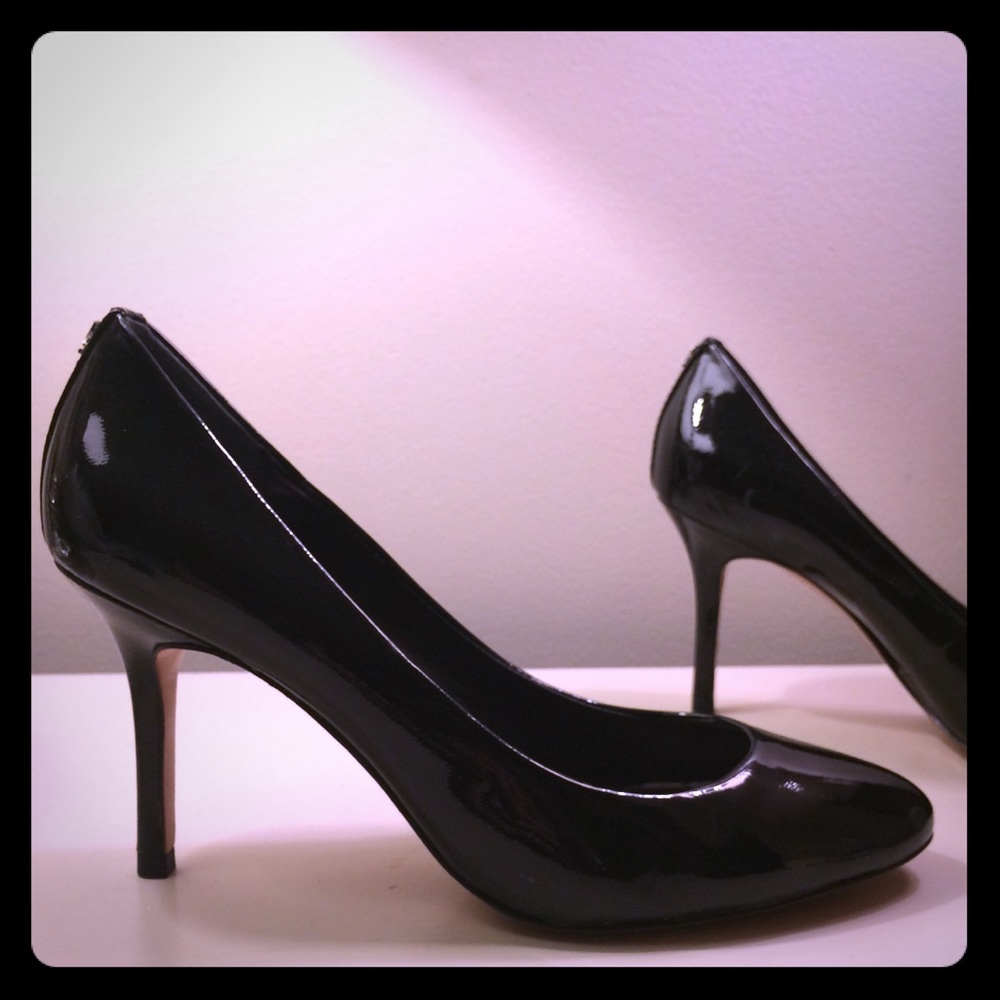 Classic Coach black patent leather pumps